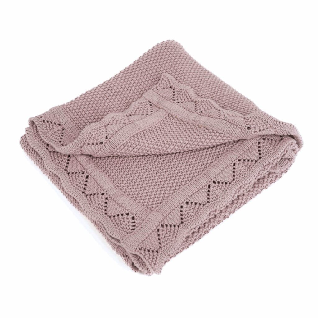 Heirloom baby blanket in pale mauve color