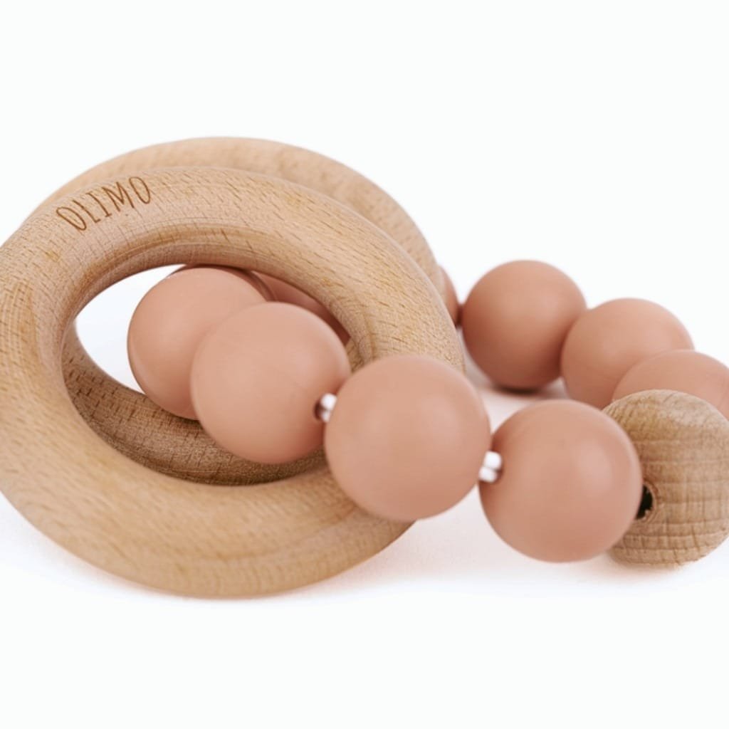 Wooden silicone teething ring in muted color